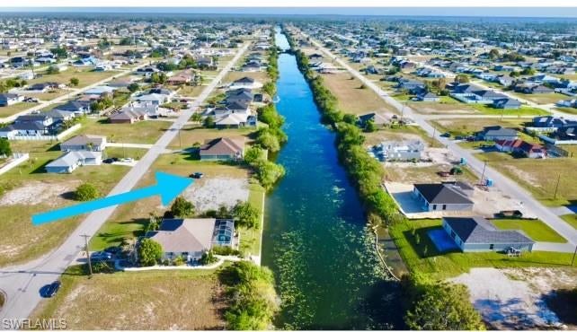 Seller Motivated!! This ready to build lot located in growing neighborhood of NE Cape Coral. Situated in a quiet neighborhood with close access to shopping, school & restaurants. Build your next dream home here with this waterfront lot today!