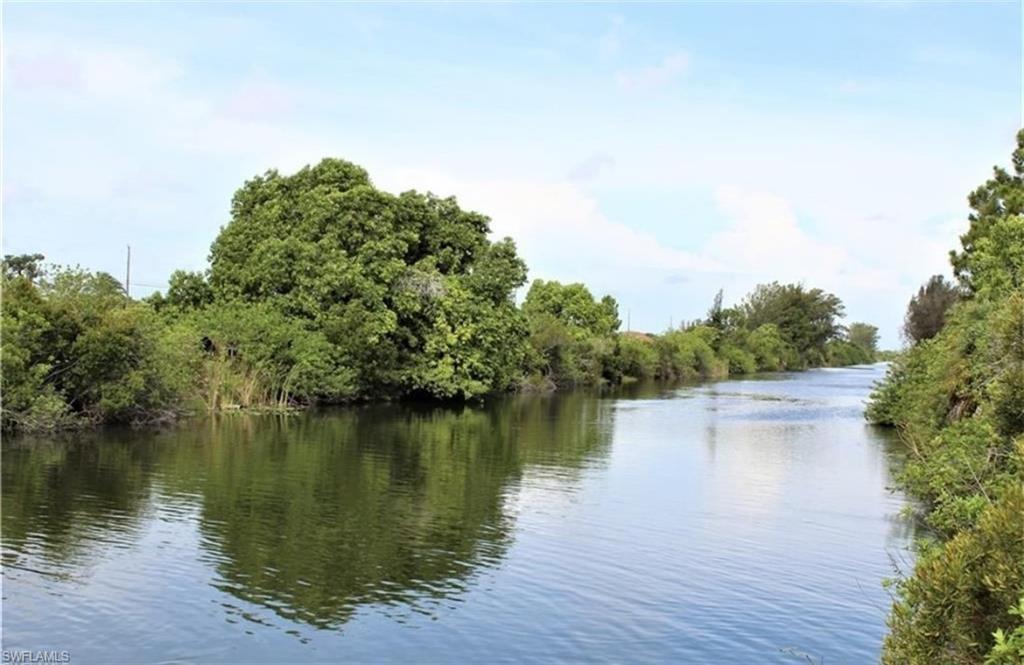 Waterfront residential lot located in north Cape Coral. HUGE CANAL, close to schools, restaurants, shopping and quick commuting to Fort Myers and Punta Gorda. Whether you want to fish right off your backyard or just relax and watch the sunset this northern exposure lot is just right for you! Build now or invest for the future. Lot prices are increasing daily, make sure to secure your piece of paradise today!