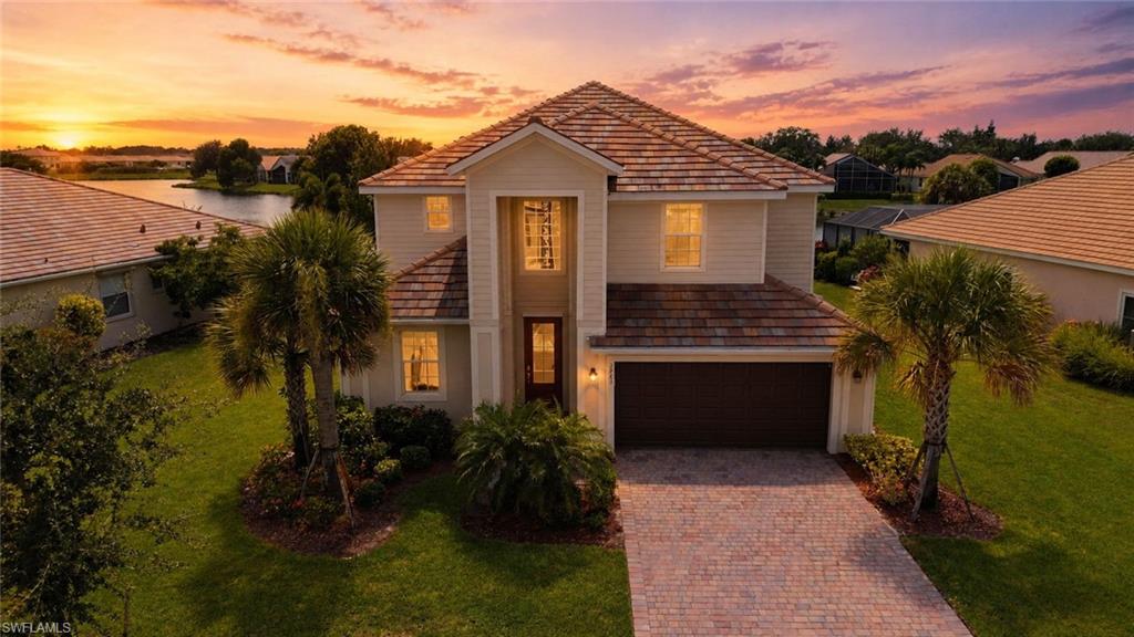 Located on a lakefront homesite in gated Hampton Lakes at River Hall, this turnkey former fullt furnished model 2021 Monte Carlo model by Lennar offers approximately 3,302 square feet, five bedrooms, three full baths, a screened private pool and a two-car garage.

The two-story floor plan includes formal living and dining rooms, an open kitchen, breakfast nook and great room with direct access to the covered lanai and pool. Interior features include granite countertops, a center island, stainless steel appliances, crown molding, tile flooring and window treatments. A first-floor bedroom and full bath provide flexible accommodations for guests or use as a home office.

Upstairs, the owner’s suite features lake views, dual vanities, a soaking tub and separate shower. Additional bedrooms, a loft and a separate bonus room provide flexible space for recreation, media, work or storage.

Exterior features include concrete-block and stucco construction, a tile roof, hurricane storm panels, paver driveway and two-car garage. Connected-home features include a smart front-door lock, programmable thermostat and video doorbell. The covered lanai overlooks the screened pool and lake.

Hampton Lakes residents have access to the River Hall Town Hall Amenity Center, featuring an approximately 14,000-square-foot clubhouse, lagoon-style pool, fitness and aerobics facilities, meeting and multipurpose rooms, playground, basketball court, eight pickleball courts, two tennis courts, two bocce courts and outdoor recreation fields. Hampton Lakes is not a bundled golf neighborhood but homeowners may join River Hall Country Club, membership is optional with its own categories, pricing and availability. Convenient access to I-75, Fort Myers-area shopping, dining and recreation.