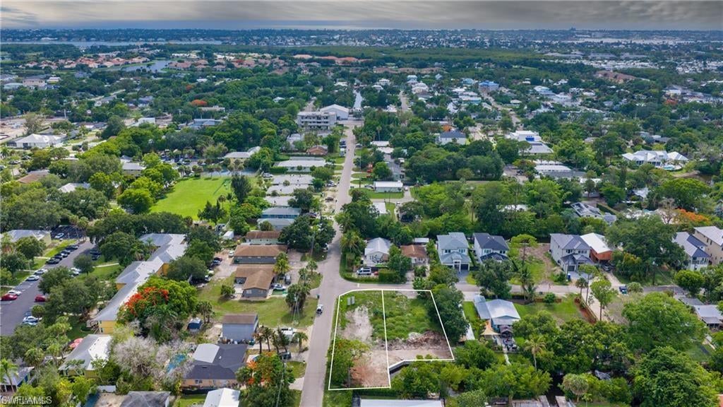 0.14 acres zoned residential for single-family or duplex development! Brand new SEA WALL. Fully upland, level lot offers public utilities and NO HOA, creating an exceptional opportunity to build in the rapidly growing Bayshore District of Naples. This homesite is surrounded by new coastal-inspired construction and luxury residences, making it the perfect setting for a custom home tailored to your lifestyle providing endless potential. Minutes from Downtown Naples, 5th Avenue South, Gulf beaches, marinas, dining, shopping, and entertainment, the location offers both convenience and long-term value. Enjoy close proximity to Celebration Park, Naples Botanical Garden, Rebecca's Wine & Jazz Bar, local cafés, art galleries, and the expanding collection of restaurants and lifestyle destinations that continue to transform the Bayshore area. With inventory becoming increasingly limited in this evolving area, 3432 Canal Street presents a rare opportunity to secure a prime piece of Naples real estate and build your dream home!
