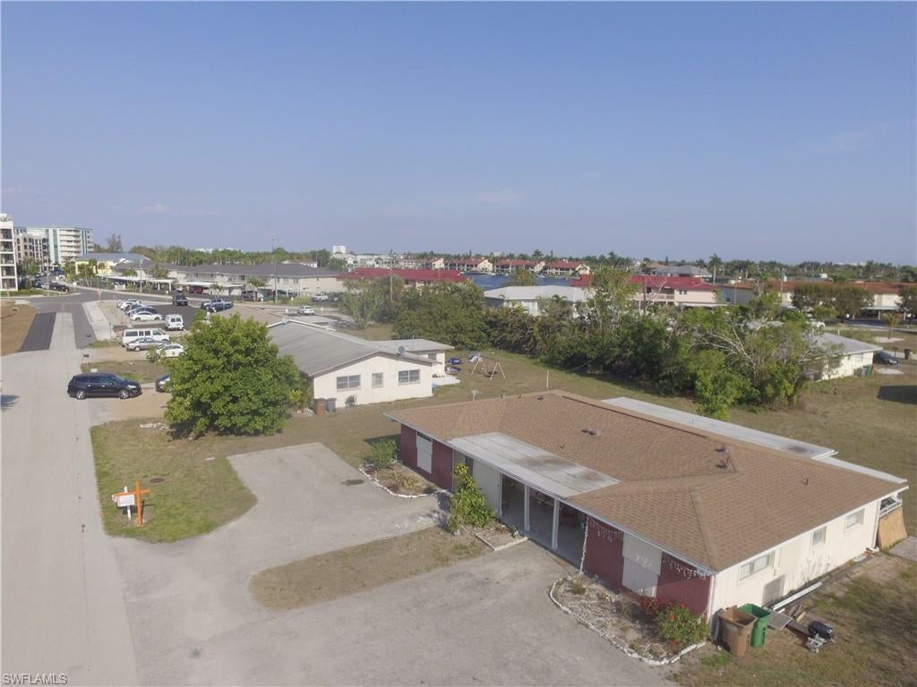 Enjoy vibrant downtown living in this beautifully updated 4-bedroom, 4-bathroom duplex  located just steps from the shops, restaurants, and entertainment of Cape Coral’s city center. Inside, you’ll find a spacious open kitchen with granite countertops and plenty of cabinet space, along with convenient washer and dryer hookups. The Duplex has been renovated with modern finishes throughout and features a screened porch. With its prime location within walking distance to downtown and easy access to major roads, this duplex offers the perfect combination of comfort and convenience
