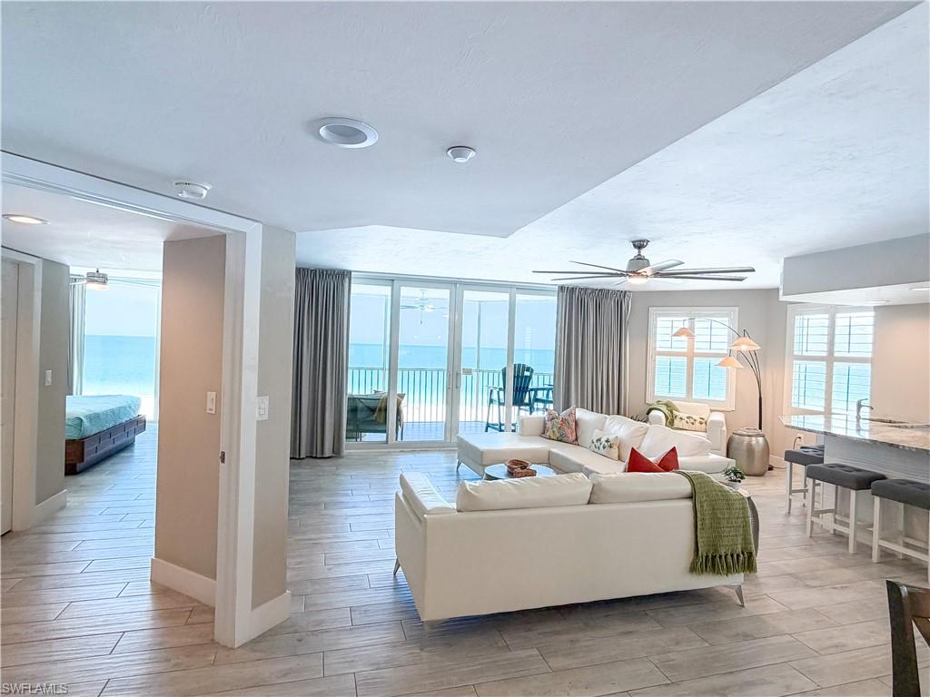 Priced BELOW Appraised Value! Luxury Gulf front living with PROVEN RENTAL PERFORMANCE at Gullwing Beach Resort. This fully furnished, TURNKEY 10th-floor Gulf-front 3-bedroom, 2-bath condo for sale at Gullwing Beach Resort in Fort Myers Beach offers the rare combination of a luxury beachfront retreat, second home, and proven vacation rental investment. Located on the Southwest Florida Gulf Coast, this professionally managed beachfront condo-hotel allows owners to enjoy flexibility of personal use or participate in a SUCCESSFUL RENTAL PROGRAM. With an already IMPRESSIVE  82% OCCUPANCY RATE from January through July 2026 (outperforming the Fort Myers Beach average of 55-65%) and a reservation calendar with strong reservations booked for the balance of 2026, this residence offers proven rental demand and exceptional ownership flexibility. From the moment you enter, the PANORAMIC GULF VIEWS and breathtaking SUNSETS define the coastal lifestyle. Offering nearly 2000 square feet, this HIGH FLOOR residence features expansive water views from every room and spectacular sunset views from the oversized private lanai. Enjoy direct access to Fort Myers Beach's white sand shoreline just steps away, with endless opportunities for boating, fishing charters, dolphin watching, kayaking, paddle boarding, and island excursions. The beautifully updated interior is designed for both relaxed coastal living and entertaining. The open kitchen features white shaker cabinetry, stainless steel appliances, stainless range hood, designer backsplash, and stunning countertops. A built-in bar with seating creates an inviting gathering space that flows seamlessly into the living and dining areas. Tile flooring throughout enhances the clean coastal design, while the private primary suite offers Gulf views, direct lanai access, walk-in closet, and ensuite bath. Additional features include two guest bedrooms, in-residence laundry, and a locked walk-in owner's closet for secure storage while the residence is rented. Gullwing Beach Resort delivers a true beachfront resort experience with direct beach access, heated Gulf-front pool and spa, fitness center, elevated tennis court, beach volleyball, barbecue grills, guest bicycles, business center, private parking, and trolley access. Recent building improvements include impact-rated doors and windows, a newer roof, updated elevators, and a full-building generator. Ideally located on the desirable south end of Fort Myers Beach, this residence is minutes from Lovers Key State Park, marinas, waterfront dining, shopping, and the entertainment of Times Square. Whether you are seeking a luxury beachfront retreat, a second home, or a proven vacation rental investment, this exceptional Gulf-front residence offers the views, lifestyle, amenities, and rental performance that define premier Southwest Florida ownership.