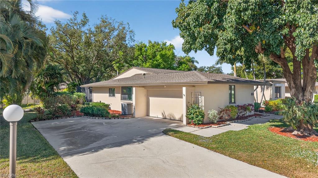 Enjoy maintenance free living in this spectacular villa located within the highly desirable neighborhood of Whiskey Creek. This impeccably cared for unit has a modified Banyan floorpan to be unlike other villas. Ample matching cabinets throughout the home provide maximum storage.  A spacious and well laid out kitchen features built-in appliances and has convenient dining room access. The living room is spacious and fills with natural light. The screened in lanai is surrounded with lush mature landscaping. This may well be the best lot in Wyldewood Lakes as the community pool is only steps out of your backyard. It also features an unusually large paved driveway that can easily accommodate 4 vehicles in addition to your two-car garage making ideal for when guests visit. The HOA runs very efficiently offering a tremendous value and keeping costs down for its residents. Fees include an individual homeowners policy for the unit.  Owners only need to insure their contents if they desire. They also provide a flood policy for the buildings, even though each building is outside of a flood zone.  Wyldewood Lakes has never experienced flooding from any past storm. All buildings will be painted in spring 2026 from allocated reserve funds.  Roofs are covered by the HOA and were recently replaced in 2020.  This includes bi-annual inspections and gutter cleaning from Crowther Roofing. Internet and cable with DVR, landscaping, interior and exterior pest control, driveway and walkway power washing, rec facilities round out some of the other benefits.  Come see why this quiet and quaint community is such a great place to live.