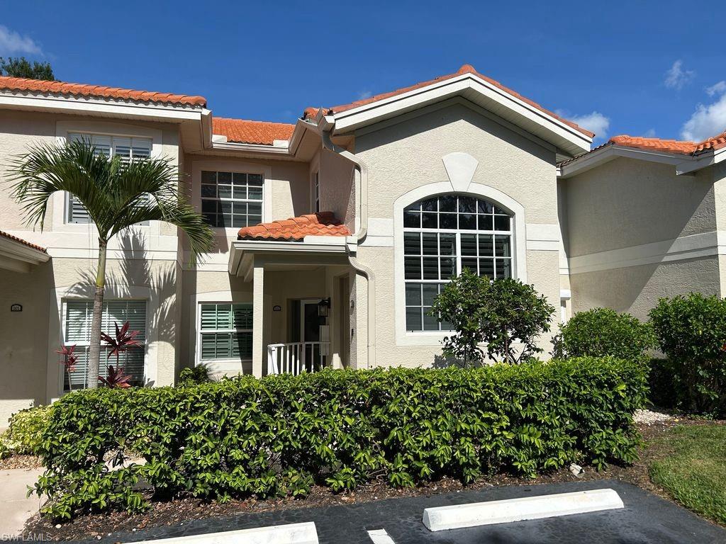 Discover refined Florida living in this beautifully renovated 2 BR, 2 BA condo in the highly sought-after gated community of Pipers Grove in North Naples. Thoughtfully updated, this light filled residence offers an open concept layout with elegant finishes, including porcelain wood like tile in the main areas & luxury vinyl wood tile in the master bath. The stylish kitchen features stainless steel appliances, pantry, breakfast bar & modern lighting. The master suite is a tranquil retreat with walk in closet, peaceful lake views & updated dual vanity & walk in shower. A split guest bedroom & bath provide comfort & privacy for visitors. Additional upgrades include grasscloth wall coverings in both bathrooms, plantation shutters, updated lighting & fans, 2025 a/c system, programmable Nest a/c  /heat and new water heater in 2022. Enjoy the lanai with eastern exposure, serene water views, & beautiful morning sunrises. Condo comes with one assigned carport parking space & additional guest parking. Residents enjoy a screened main pool, clubhouse, fitness center, tennis, bocce, & 2.5 miles of walking & running trails all within the gated community. Ideally located just minutes from Vanderbilt Beach, Mercato & downtown Naples, this home offers the perfect blend of lifestyle, convenience & coastal charm.