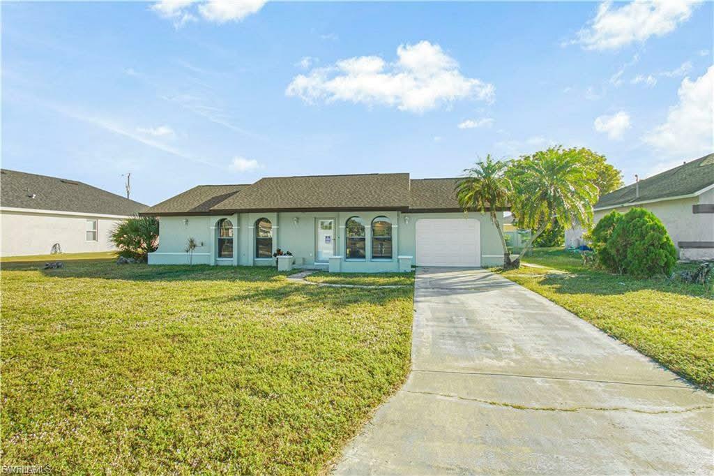 Welcome to this beautifully remodeled single-family home nestled in a quiet, desirable neighborhood in the sought-after Southwest Cape Coral area. Offering 3 bedrooms and 2 full baths, this move-in-ready residence features a newer roof and has been thoughtfully updated from top to bottom with fresh paint, new floorboards, and luxury vinyl plank flooring throughout. The fully remodeled kitchen is a standout, showcasing elegant granite countertops, crisp white shaker cabinetry, and a clean, modern aesthetic ideal for both everyday living and entertaining. The spacious primary suite delivers a true retreat, complete with an adjoining sitting room that adds a touch of luxury and flexibility, an ensuite bath with dual-sink vanity, new mirrors, and updated plumbing fixtures, plus private access to the screened back lanai. The secondary bathroom has also been fully refreshed with a new vanity, mirror, lighting, and updated plumbing fixtures for the shower/tub combination. Additional upgrades include new interior and exterior doors, new garage door, and washer/dryer hookups for convenience. Step outside to enjoy the oversized, fully fenced backyard—perfect for pets, play, or future outdoor enhancements—while the screened lanai offers a comfortable space to relax year-round. Ideally located near parks, recreation, dining, and shopping, this home combines modern upgrades, generous outdoor space, and a peaceful Southwest Cape Coral setting. Schedule your private showing today and experience the lifestyle this home offers

Seller Financing Options Available with 20% down payment. No Subject to Offers will be considered