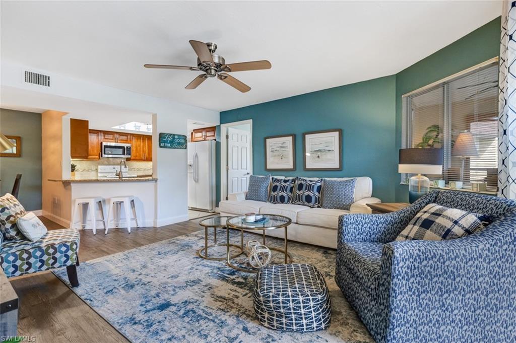 MOTIVATED SELLER! Only 5 miles to the beautiful Gulf beaches, close to shopping, the airport and in FLOOD ZONE X, no flood insurance required! This beautifully remodeled **SECOND-FLOOR END UNIT** is sure to impress from the moment you arrive. The fully remodeled open-concept kitchen features a breakfast bar, granite countertops, and a built-in wine fridge, all accented by fresh interior paint throughout. The master bathroom has been tastefully updated with an elegant upgraded shower and vanity. The spacious floor plan flows effortlessly, now enhanced with new luxury vinyl plank flooring paired with ceramic tile in key areas, creating a modern and cohesive look. Storage is abundant with walk-in closets in both bedrooms, updated plumbing throughout (2024), newer air conditioner (2023) and brand new water heater (2026). There is over $15,000 in recent upgrades! Relax on the spacious lanai with your favorite beverage and enjoy the tranquil surroundings. Fountain Lakes offers a wealth of amenities, including a 9-hole golf course, pickleball, tennis, a fitness center, playground, billiards room, picnic area with grills, and a swimming pool—plus an additional pool at The Greens. This beautifully updated, upper end unit truly has it all—don’t miss it! This property is priced to sell!