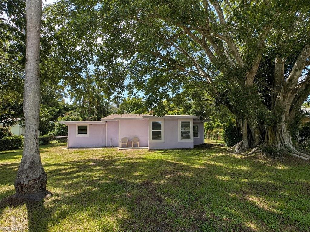 Welcome to this charming 3-bedroom, 2-bathroom home offering comfortable living in a convenient location. The home features tile flooring throughout, a spacious fenced backyard, and mature trees that provide beautiful shade and a peaceful outdoor setting. The generous backyard offers plenty of room for pets, entertaining, gardening, or enjoying the outdoors. Conveniently located near the interstate with easy access to Fort Myers, shopping, dining, and everyday amenities, while still offering a quieter residential setting away from the busier areas. A great opportunity for those looking for a comfortable home with a spacious yard and convenient access to Fort Myers.