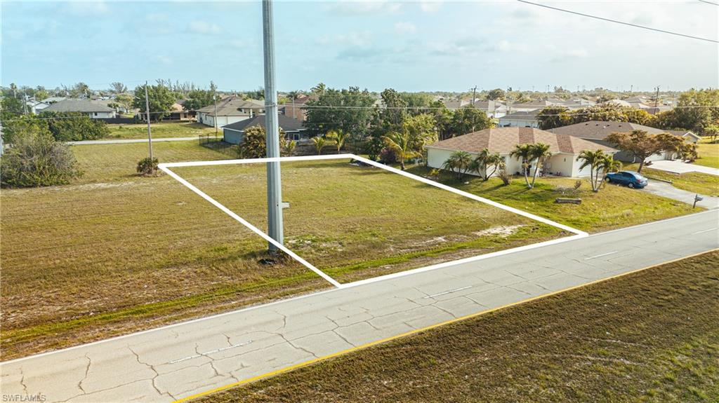 * REDUCED * Prime NW Cape Coral Lot – Unbeatable Location & Future Growth Potential!
Don’t miss your chance to own a piece of one of the fastest-growing communities in Cape Coral! This cleared lot, located on Tropicana Parkway W, offers an incredible opportunity to build your dream home in a highly sought-after area. With nearby schools, parks, boat ramps, shopping, restaurants, golf courses, and a family fun park, you’ll have everything you need just minutes from your doorstep. Whether you’re a boating enthusiast or simply looking for a vibrant, family-friendly neighborhood, this location has it all. With rapid growth on the horizon, this is the perfect time to invest before property prices rise dramatically.

Key Features:

Prime NW Cape Coral location on Tropicana Parkway W.
Cleared and ready for your custom home.
Close to schools, boat ramps, parks, golf courses, and shopping.
Ideal for boaters and outdoor enthusiasts.
Future growth potential – Invest now before prices climb.

This is an outstanding opportunity for both investors and future homeowners. Plan your future here today and secure a promising investment in a community on the rise!