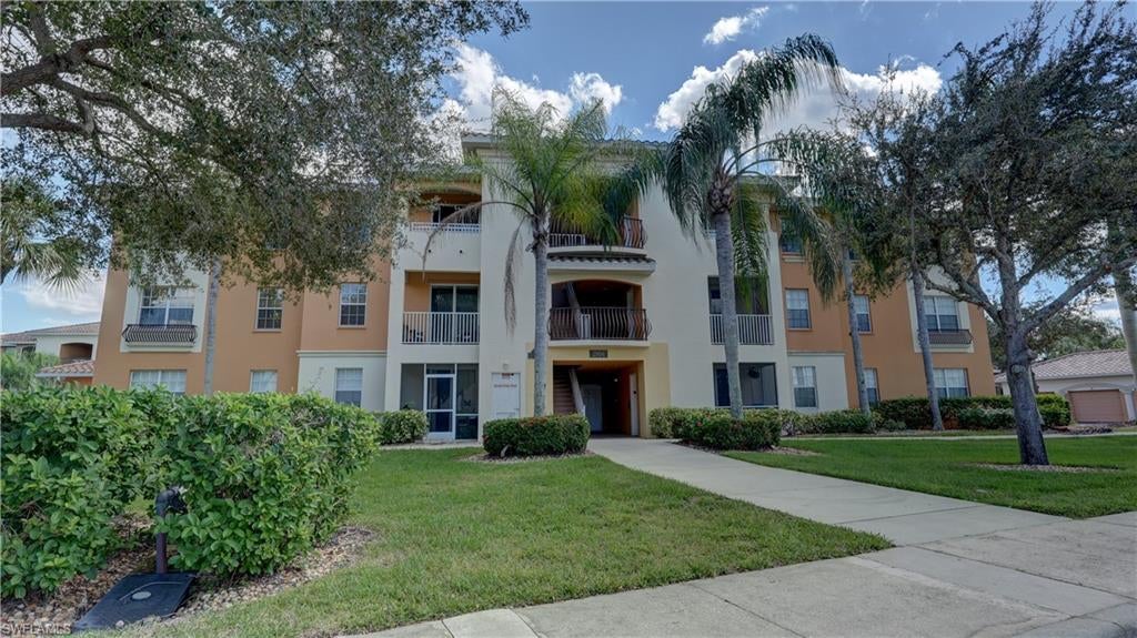 Welcome to your Florida retreat! Whether you're searching for a year-round residence, seasonal getaway, or vacation home, this beautifully updated first-floor, 2-bedroom plus a large den, 2-bathroom condo in the gated community of Isles of Porto Vista is ready for you! Offered fully furnished, including decorations, this move-in-ready condo features luxury vinyl flooring throughout, a beautifully remodeled kitchen with granite countertops, breakfast bar, updated white cabinetry, and stainless steel appliances. The spacious living and dining areas offer a comfortable setting for everyday living and entertaining. Both bathrooms have been tastefully remodeled with granite countertops and tiled showers. Enjoy added peace of mind with a brand-new, just-installed air conditioning system and a newer water heater. The condo also features a convenient laundry room complete with a washer, dryer, and additional cabinetry. Master bedroom comes with a large walk-in closet. Enjoy sunsets in your open lanai with a small storage space. And there's more! This condo includes a detached one-car garage—an end garage with windows, offering natural light and valuable additional storage space. Step outside and enjoy the Florida lifestyle at Isles of Porto Vista, a beautifully maintained gated community featuring a clubhouse, fitness center, pick-ball court, community game room, resort-style swimming pool, barbecue area, and children's playground. Conveniently located near supermarkets, shopping, dining, and with easy access to Fort Myers, this property offers a wonderful combination of comfort, convenience, and Florida living. Just bring your suitcase and start enjoying your new home! Don't miss this opportunity and call today to preview this unit!