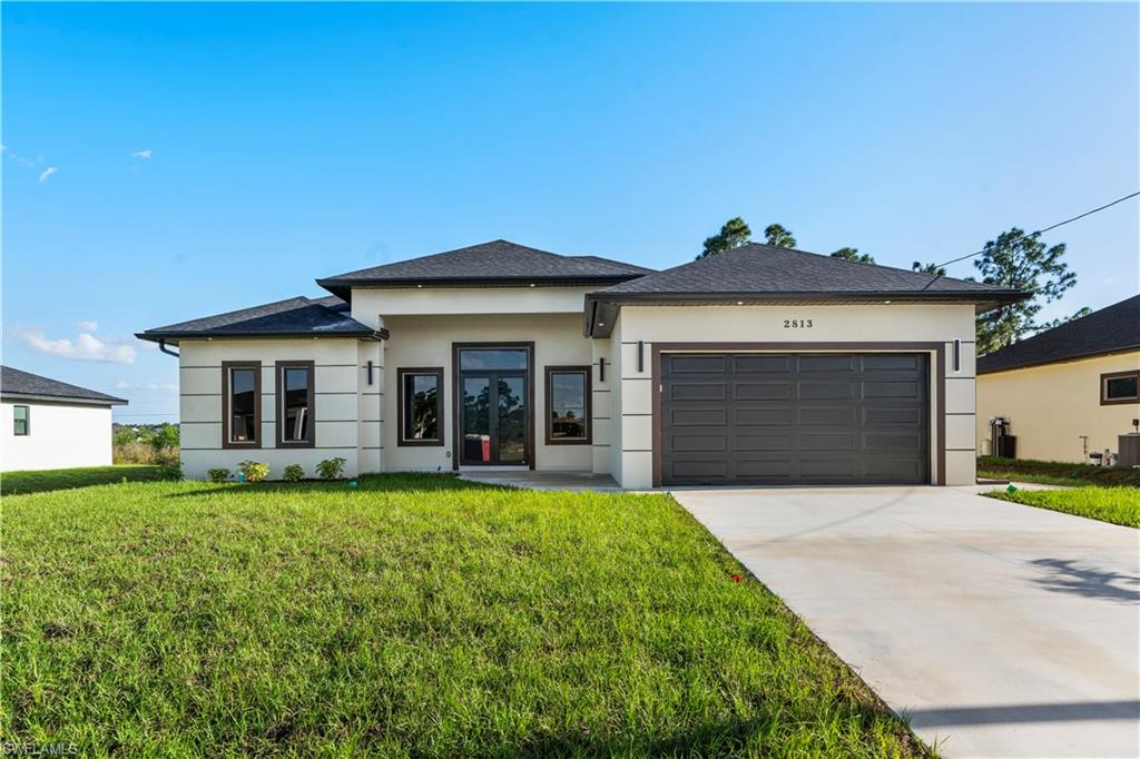 Seller is willing to contribute towards closing costs. Welcome to this beautifully constructed new home in the heart of Lehigh Acres, offering modern design, quality craftsmanship, and thoughtful upgrades throughout. This spacious residence features 3 bedrooms 2 bathrooms plus den, perfectly designed for comfortable living and entertaining. Situated on a generous 0.25-acre lot, the property provides ample outdoor space for relaxation, future additions, or recreation. Centrally located, you’ll enjoy convenient access to schools, shopping, dining, and everyday amenities. This move-in-ready home is the perfect blend of style, space, and location—don’t miss the opportunity to make it yours.