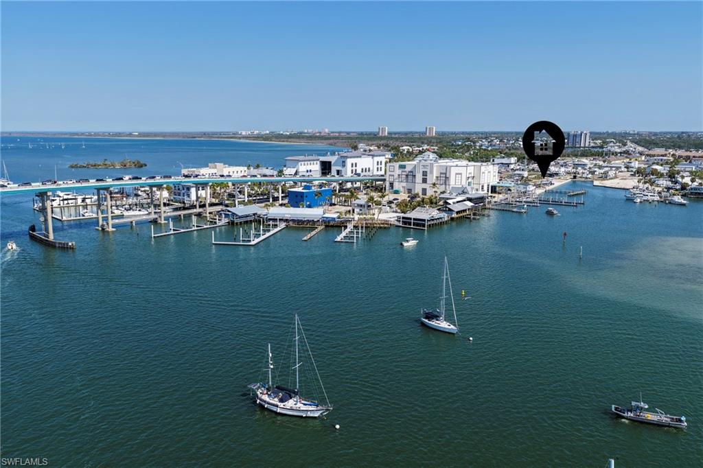 LOCATION, LOCATION, LOCATION! Just a walk over the bridge to beautiful Fort Myers Beach, this is your opportunity to own a piece of paradise in Gulf Cove, a 55+ waterfront co-op community! Ownership includes a 1/60th interest in the community, offering a unique opportunity to enjoy the Florida waterfront lifestyle. The Board of Directors is currently working on a process for boat slip assignments. Enjoy affordable HOA fees of just $800 per quarter! Community sewer, water, and electric infrastructure has been completed, and a newer electric power pedestal is already installed on the lot. Highway-ready RVs are currently permitted on the lot through October 2027. The spacious lot features a concrete pad with room to accommodate a double-wide trailer. Any new home construction must meet FEMA standards, with homes elevated approximately 8–10 feet above ground. Water, sewer, and electric are available. Don’t miss this exciting opportunity to enjoy the sunshine, coastal charm, and laid-back lifestyle of Southwest Florida, just moments from Fort Myers Beach!
