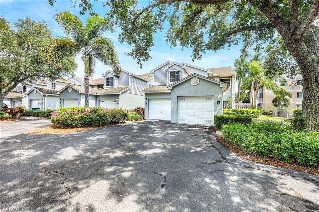 Enjoy this beautiful, 40-acre lake community with spectacular sunrises and sunsets while relaxing on your lanai or sitting in the living room. Enter this well-maintained second floor residence featuring vaulted ceilings, spacious primary bedroom with walk-in closets and ensuite bathroom. Its split bedroom floor plan and second bathroom are perfect for family and friends. Large eat-in kitchen with lots of cabinets and pantry. One-car attached garage to store everything you need. Look down from your lanai at friends and family frolicking in the community pool below, giving you a feel of your own retreat. Endless amenities available to residents include a two-story Old Florida clubhouse complete with a second pool, sauna, weight room, shower, kitchen facilities for catering private parties, library, piano and game rooms. The center is always abuzz with community events, club meetings and other activities for all ages. Also enjoy fishing, canoeing and kayaking on the lake, with boat storage available. Lead an active lifestyle with clay tennis and pickleball courts, a tot playground, shuffleboard, bocce and basketball courts, as well as a mile and one-half scenic walking path. You are close to shopping centers, pristine beaches, and championship golf courses, everything you need just minutes away. Quarterly association fees cover Blue Stream cable, water, sewer, trash, pest control and recycling services. Lakeside — a close knit community where friendships flourish and memories are made!