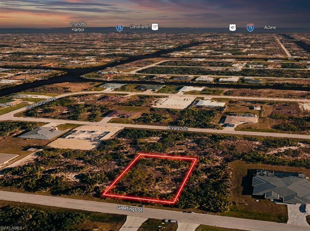 LAND WITH NEW CONSTRUCTION NEARBY! This Port Charlotte parcel on Greetings is a great opportunity to secure land in an area where new construction is already taking place and utilities are nearby. Whether you're looking to build your future home, invest for the long term, or grow your land portfolio, this property is worth a look. Get in early and take advantage of the continued growth in Southwest Florida. You can't create more land, but you can get in before the next wave of development! Buyers and agents are encouraged to independently verify zoning, permitted uses, dimensions, access, utilities, building requirements, and all other property information with the appropriate county agencies. APN: 412128202005. GPS: 26.885435, -82.213854.