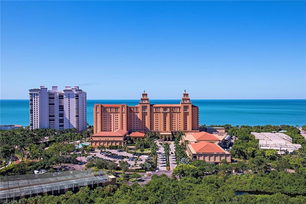 Perched atop the prestigious Trieste at Bay Colony, this exceptional residence offers 3,415 square feet of luxurious living complemented by spectacular panoramic views of the Gulf, the Bay, and both of Naples' renowned Ritz-Carlton resorts. Featuring three bedrooms plus a dedicated den, three full baths, and one half bath, this remarkable home has been thoughtfully refreshed and is ready to enjoy. Recent enhancements include fresh interior paint throughout, newly painted white kitchen cabinetry, updated lighting fixtures, a refreshed primary bath, and new guest bathroom vanities. The Trieste recently completed a comprehensive lobby-level renovation by Olsson-Fernandez Design, fully paid for by the current owner. Additional amenities include a state-of-the-art fitness center, a resort-style pool, and two guest suites for visiting family and friends. Exterior repainting is currently underway, adding the finishing touch to this exceptional Bay Colony residence. With its breathtaking views, refined updates, and outstanding amenities, this is luxury living at its finest.