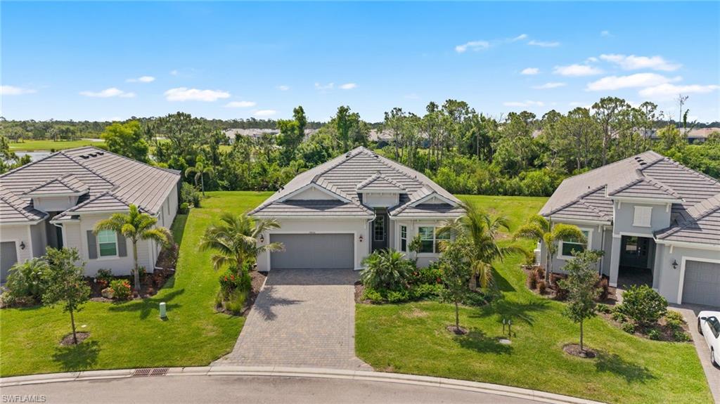 MOVE-IN READY! Tropical Oasis with Endless Privacy! Welcome to this one-of-a-kind, turnkey-furnished home in the prestigious Heritage Landing community. This is one of the few properties that backs up to a beautiful nature preserve, providing unmatched privacy and a peaceful place to unwind. Built in 2023, this rarely available Angelina floor plan sits on an oversize lot and offers three spacious bedrooms, designed to provide understated luxury, serene surroundings, and effortless living. With preferred southern exposure, the home is bathed in natural light - ideal for enjoying the Florida sunshine by your pool and spa. The outdoor oasis is private and designed for entertaining, with ample room for sun loungers, dining, and relaxed outdoor living. Inside, the open layout features soaring tray ceilings, sleek white cabinetry, GE Smart appliances, modern wood-grain tile flooring, impact windows and sliders, generous storage, and a 2-car garage with epoxy flooring. Positioned safely within an X flood zone and unaffected by recent storms, this property offers both security and the benefit of reduced insurance costs. For golf enthusiasts, the community features a fantastic 18-hole, par-71 golf course, recently ranked #2 among Florida’s public courses by GolfPass. Enjoy the added benefits of low HOA fees, which include a social membership that grants access to world-class amenities: a resort-style pool and spa, tiki bar, a brand-new clubhouse with multiple dining option, six har-tru tennis courts and six pickleball courts, bocce, a full-service wellness center with sauna, massages, facials, and manicures, a state-of-the-art 24/7 fitness center, Pilates classes, the championship golf course with a pro shop, putting greens, and scenic walking trails. Perfectly situated with quick access to Punta Gorda and RSW Airport, I-75, Cape Coral, Ft. Myers, and Venice Beach, this home offers proximity to world-class fishing, boating, and Florida’s most beautiful sandy shores. This is more than a home - it’s a lifestyle.