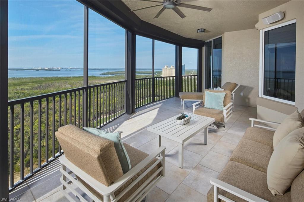 This exceptional corner residence in Treviso captures sweeping views of The Colony’s beautifully manicured grounds and the Gulf beyond. Step directly from your private elevator into a light-filled, open-concept interior where floor-to-ceiling glass and soaring 9’8” ceilings create a seamless connection between indoor and outdoor living. Thoughtfully designed for both entertaining and everyday comfort, the residence features three ensuite bedrooms, a private study, versatile family room, and gracious formal living and dining spaces. A charming breakfast nook offers the perfect setting for relaxed mornings, while expansive windows throughout showcase panoramic views and abundant natural light. Treviso complements the residence with beautifully updated common areas featuring transitional furnishings and marble flooring overlooking tranquil water features. Residents enjoy three guest suites, including a two-bedroom apartment, along with an elegant social room, billiards room, theater, updated fitness center, resort-style pool and spa, and a separate social pavilion. Ownership in The Colony also includes access to an exceptional collection of lifestyle amenities, including The Bay Club for private waterfront dining, a 34-acre island beach park with boat shuttle, kayaking, canoeing, tennis, pickleball, bocce, and sailing. Ideally located near Coconut Point and approximately 15 minutes from Southwest Florida International Airport, this residence offers an effortless blend of luxury, convenience, and the distinctive Colony lifestyle.