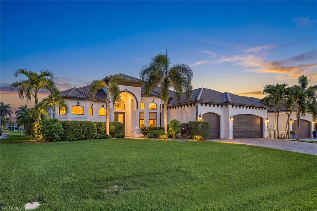 LUXURY GULF-ACCESS IN THE HEART OF SW CAPE CORAL! This beautifully renovated and fully furnished 3-bedroom + den, 3-bath home offers 2,528 sq. ft. of living space, a 3-car garage, NEW ROOF, impact windows and doors, and an exceptional waterfront lifestyle. Boaters will appreciate the private dock, 10,000-lb boat lift with canopy, and Gulf access right from your backyard. Step outside to your private tropical retreat featuring a screened pool and spa, expansive pavered lanai, outdoor kitchen and multiple areas for dining, entertaining and relaxing by the water.

Inside, the home has been thoughtfully renovated with a sophisticated coastal style, featuring tile flooring throughout, designer-selected finishes, soaring ceilings and an open-concept layout filled with natural light. The stunning kitchen is the centerpiece of the home with abundant cabinetry, an oversized island, beautiful countertops and generous entertaining space overlooking the great room and outdoor living area. The primary suite is a true retreat with direct lanai access and a completely redesigned spa-inspired bath featuring dual vanities, a freestanding soaking tub and an impressive walk-through shower with designer tile. An en-suite guest bedroom provides privacy for visitors, while a separate pool bath adds convenience for outdoor entertaining.

The pavered driveway, lush tropical landscaping and impressive 3-car garage complete the package. Ideally located in highly desirable Southwest Cape Coral, just minutes by golf cart to Cape Harbour, The Lobster Lady, waterfront dining, shopping and entertainment. Whether arriving by car, golf cart or boat, this home puts the best of the Southwest Florida lifestyle within easy reach. Move in, unpack your suitcase and start enjoying the waterfront lifestyle from day one. Schedule your private tour today!