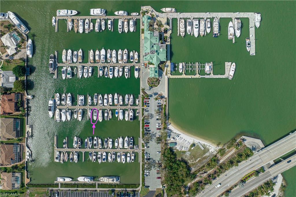 Discover this exceptional marina slip at Marco Island Marina. This 45-foot slip on C-dock, with a maximum LOA of 49 feet, is conveniently located near the parking area. It comes with deeded ownership, and with board approval, you can install a boat lift in the slip. Ownership offers the flexibility to live aboard your boat or rent out the slip when not in use, with optional marina management available to generate extra income. Located close to island amenities with quick access to Marco River and the Gulf, this marina provides everything for the ultimate boating experience. The docks feature durable Bellingham concrete floating docks, and a recent approved project aims to extend all piling lengths for better storm resilience. Quarterly fees amount to $791.88 ($3,167.52 annually), with real estate taxes paid separately. Amenities include a clubhouse with a pool, mailboxes, laundry facilities, showers, ice, and a stylish owner’s lounge. Enjoy a secure, protected marina basin for added protection while being part of a friendly community at Marco Island Marina.