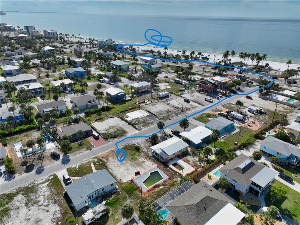 Build your dream home on this desirable single-family pool lot on Fort Myers Beach! Located mid-island, this property offers a peaceful retreat while still being conveniently close to all the action. Enjoy the quiet comfort away from the crowds, yet just a short walk to the beach access.
This prime location offers unparalleled convenience:
• Grocery & Dining: Only 8 blocks to the island's only Publix grocery store, Snook Bight Marina, and two popular restaurants.   
• Entertainment: A short distance to Times Square and Margaritaville, offering a variety of dining and entertainment options.
• Essentials: Right next to the seasonal weekly Farmer's Market and the only CVS on the island.
This lot presents a fantastic opportunity with several building options available. We can connect you with builders who offer everything from elevated prefab modular homes to traditional and custom designs, ensuring your vision becomes a reality.
Fort Myers Beach is rebuilding stronger than ever, and this is the perfect time to invest in your island paradise. Don't miss out on this incredible opportunity – your dream home awaits!