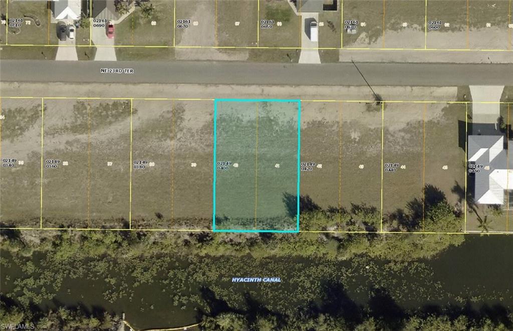 Vacant residential lot offering a generous ~10,000 sq ft parcel in the heart of Cape Coral’s Diplomat neighborhood a perfect blank canvas to build your dream home or investment property in one of SW Florida’s fastest-growing markets. This property presents an opportunity to capitalize on the area’s strong demand for new construction and close proximity to shopping, dining, schools, and boating recreation.