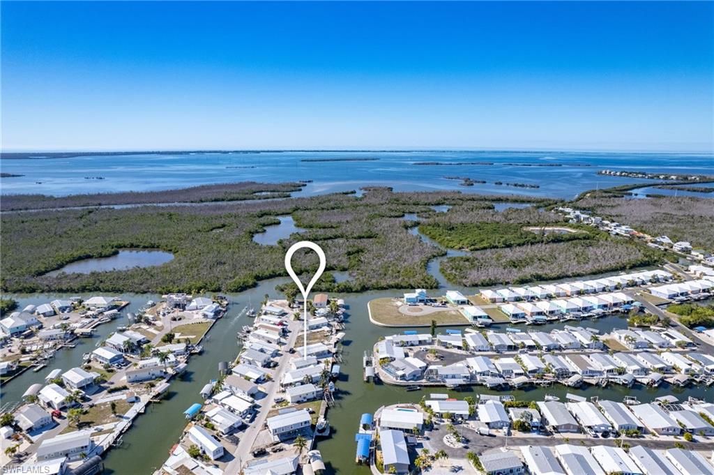 Calling all boaters, fishermen and island explores. Waterfront manufactured home in St James City. 2 bedrooms 2 baths, an open floor plan. Per owner home has never flooded. 10,000 lb. boat lift. Direct access to Sanibel, Captiva, Cayo Costa, North Captiva, Useppa, and Boca Grande. Home has a metal roof and also includes a carport and workshop. Go to local restaurants by boat or golf cart! Property is ideal for full time residence or a vacation rental.
