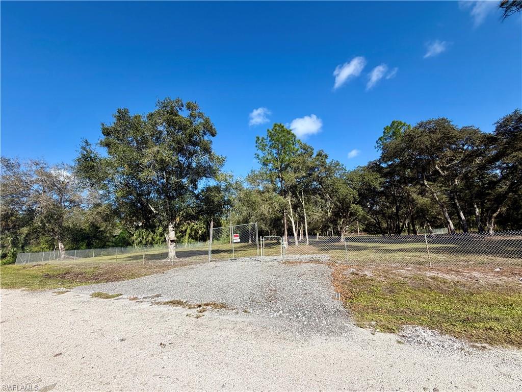 CLEARED, FULLY FENCED, 1.25 ACRES! DRIVEWAY is already installed, saving you time and money! The land has been thoughtfully cleared while preserving select mature trees to provide shade and enhance the property’s beauty. Enjoy the freedom of country living with NO HOA FEES and ANIMALS ARE ALLOWED! Whether you’re looking to build your dream home, install a mobile home, or invest in land for the future, this property offers endless possibilities. Don’t miss this opportunity to own 1.25 acres with privacy, space, and freedom!