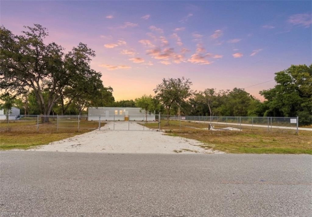 THE BEST-PRICED NEW PROPERTY ON OVER AN ACRE IN SOUTH FLORIDA. This never-occupied 2026 construction is a rare gem sitting on a spacious CORNER lot in the much desired Montura Ranch Estates. Fully fenced for ultimate privacy and security, this furnished, move-in-ready home features 3 bedrooms and 2 modern bathrooms, designed with a well thought-out layout perfect for families or weekend getaways. Situated on a paved road for easy access, you’ll enjoy the reliability of a new septic and well system, all-new appliances, and connected electricity. Best of all, there are no HOA fees, giving you more freedom to bring your toys and animals. Whether you are looking for a primary residence or a retreat about 1.5 to 2-hour drive from Miami, this property offers the perfect blend of rural tranquility and modern convenience, schedule your tour today!