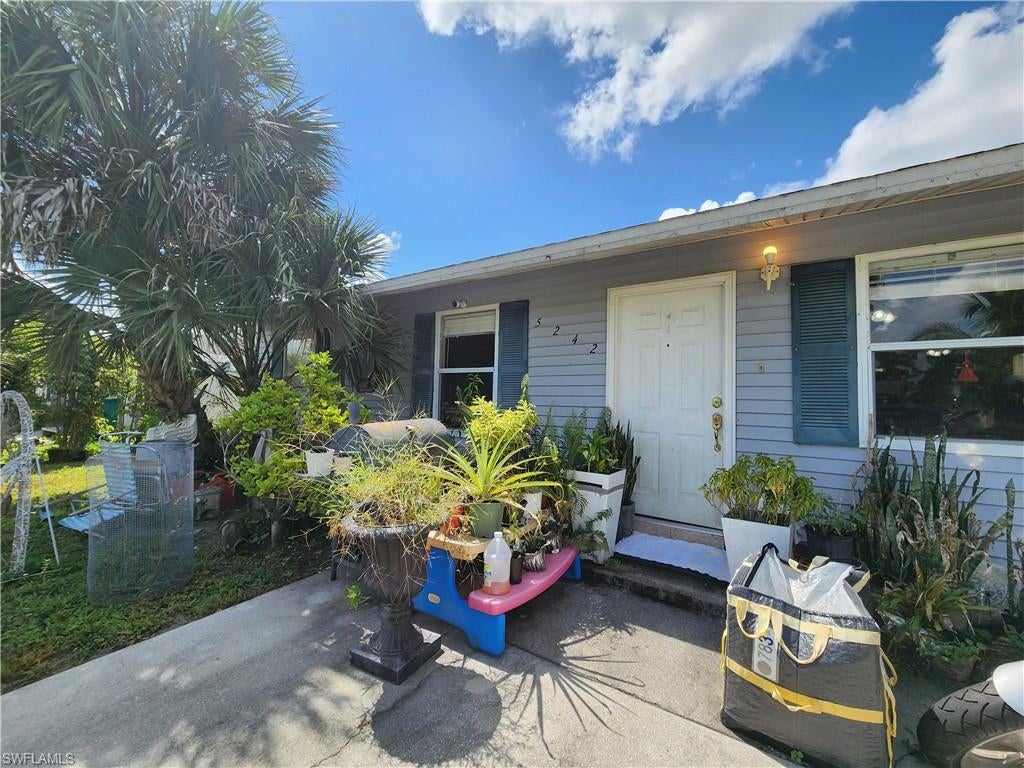 Don't miss out on this opportunity to purchase in Naples Manor Lakes.  Completely fenced in for privacy. Bring your imagination and update to your desire. This home is about location.  Schools, Beaches, Malls, 5th Ave all within 5 to 20 minutes. This is an old established neighborhood with side walks. Plenty of space in backyard to add pool. There is a permitted structure in backyard for outdoor barbecue or future addition.
