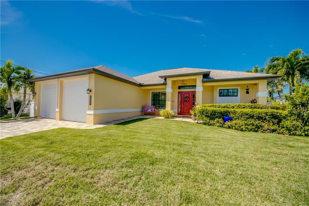 Carefree Island Living At Its Best!! Centrally located on Pine Island in peaceful Charlotte Shores, this beautiful 3 bd 2ba pool home has everything you need to live the island life! Deepwater Gulf access with no bridges, access to the community boat ramp, easy and quick access to world renowned fishing and beaches, abundant native wildlife and sunsets that are a different masterpiece every night are just a few of the great things about this island retreat. As soon as you pull in the driveway of this beautiful island home, you notice the pavered driveway, well-manicured lawn and landscaping. Immediately, you know this home is meticulously cared for! Exterior features include fresh paint, custom metalwork archway, irrigation system and oversized 10ft garage doors (26x24). As soon as you walk in the home you are met with a view of the intersecting canals that instantly soothes the soul. Soaring 10ft ceilings, open floor plan, abundant natural light, create an airy tranquil environment. The large chef’s kitchen acts as the hub of the home. It features lots of storage in the custom cabinetry, stainless appliances, oversize island and a custom tile mosaic backsplash. For extra storage, a walk-in pantry is located behind the laundry room. The bedrooms have a split layout and there is new LVP flooring throughout. The large master suite offers views of the canal and pool. The large master bath features dual sinks, dual walk-in closets and a very large walk-in shower. Bedrooms 2 and 3 are a great size and have lots of natural light. The 2nd bath also acts as the pool bath. Indoor to outdoor living is seamless in this home with the pocket sliders that lead to the screened lanai and pool. The outdoor living space really makes this home special, a large area in the lanai is under cover and an additional large space is perfect for pool parties! The heated saltwater pool has a new salt generator that was installed in 2026. The beautiful landscaping is carried through to the backyard, which is fenced, providing peace of mind for pets and children! The dock is a waterman’s dream! Lined with manicured mangroves and a rip rap seawall it includes a composite dock that spans most of the property and a 7k Covered Dolphin Hybrid Boatlift. Never spend one second worrying about “that time of year” with this house! 9ft elevation, Storm Smart hurricane screens installed in 2025, impact resistant windows and doors, reasonable insurance costs AND two 2026 Tesla Powerwall 3 systems! This home never lost power or flooded during any of the recent weather events! The Tesla Powerwall systems are paired with 11,400W of solar panels to provide a constant supply of energy. No electric bill is ever over 30.00 and LCEC gives a refund back if you can believe that! All of these incredible features combined make this home hard to beat! Come see today and Start Living The Island Life!