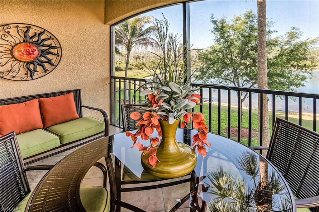 Last minute availability for March and April 2027! This is the most sought after 2/2+Den Celiana End unit on the second floor in Treviso Bay with TPC Golf included! Enjoy the serene views from your balcony, tile throughout, granite counter-tops, stainless steel appliances. This condo has social membership as well as golf transfer, which allows renters access to all the wonderful amenities that the Rilisarre Club offers; tennis courts, spa, salon, lagoon and lap pools, lakefront beach area, Bocce ball courts with a resort style feel. Treviso Bay boasts a beautifully maintained 18 hole golf course designed by Arthur Hills, a true legend in golf course design. After paying a one time transfer fee, you can golf and pay a low cart fee. The community is truly one of a kind and the location is superb.