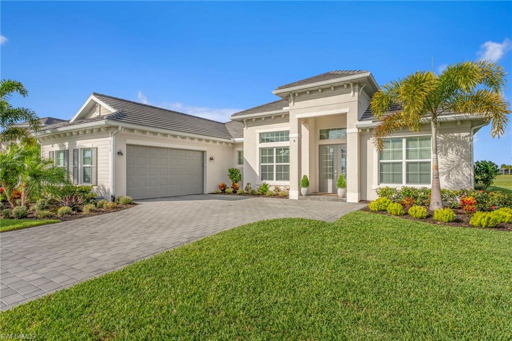 Architecturally upgraded luxury pool/spa residence with panoramic golf course and lake views in The National at Ave Maria. This exceptional 2023 Bougainvillea II model offers 4 bedrooms, 3 full baths, and approximately 2,800 sq ft of refined living, thoughtfully designed with high-end finishes and custom detailing throughout. Positioned on a premium lot with some of the most desirable views in the community, this home offers a truly elevated setting.

The interior showcases coffered ceilings, extensive crown molding, and designer paneled feature walls in the great room, den, and dining area, complemented by custom lighted built-in bookcases. Quartz countertops, premium tilework, extended tile to the ceiling in secondary baths, and heavy glass shower enclosures reflect a level of craftsmanship rarely found in the community.

Seamless indoor-outdoor living unfolds through the expansive lanai, where a custom saltwater pool/spa with automated controls anchors the space. An outdoor dining area, al fresco entertaining space, and professionally designed landscape lighting create a striking setting enhanced by sweeping golf course, lake, and sunset views.

The home is further enhanced with integrated smart technology, including a Ring doorbell, smart thermostats, whole-home indoor and outdoor audio, an irrigation system, and transferable security cameras, along with hurricane shutters.

This non-golf property includes access to all exceptional social membership amenities while benefiting from lower HOA fees, offering an ideal balance of luxury and value. Situated within Ave Maria’s most desirable community, this residence represents a rare opportunity to own a highly upgraded, design-forward home.”