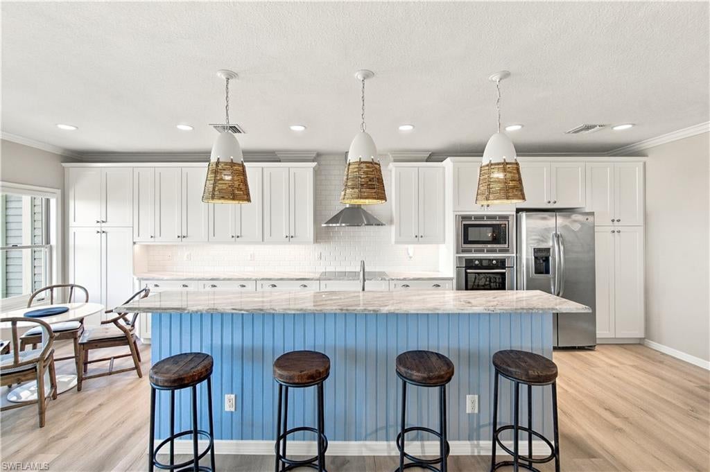VILLAS AT BAREFOOT BEACH - Residential