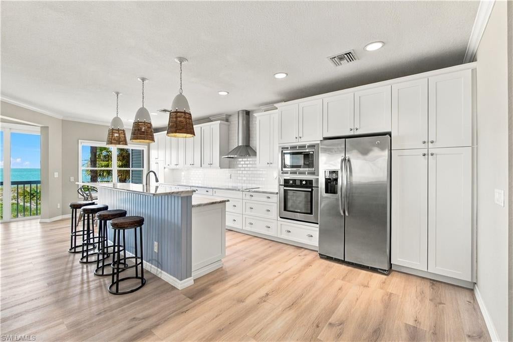 VILLAS AT BAREFOOT BEACH - Residential