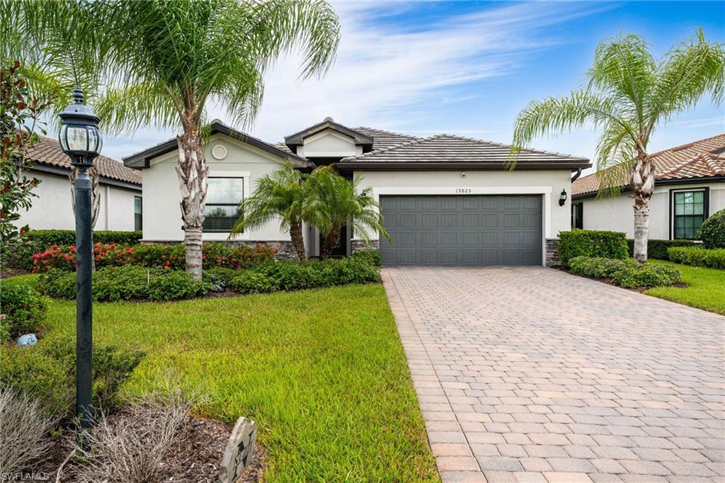 Welcome to this popular Lennar "Trevi" model! You'll have plenty of space with 4 bedrooms, 3 full bathrooms (primary and bedroom 2 have EN-SUITES), CUSTOM CLOSET systems in 2 of the bedrooms. Enjoy and entertain in the OPEN CONCEPT living room, dining room, and all WHITE KITCHEN featuring GRANITE countertops, cabinets with pull-out drawers, and STAINLESS-STEEL appliances. The unobstructed PRESERVE view lends a beautiful backdrop for you to design the perfect OASIS of your dreams in your LARGE backyard. Flood zone X, so no flood insurance required. Your new home is a quick walk to the incredible amenities, bus stop, playground, sports courts, and dog park.  The Place at Corkscrew offers a true resort feel with a gated entrance, resort-style pool, spa with poolside service from the community restaurant and bar, waterslide, splash pad, fire pits, fitness center, movement studio with classes, tennis, pickleball, bocce, full court basketball, café, bourbon bar, outdoor bar, playground, dog park, and more. For buyers looking for more than just a house, this home delivers access to one of Estero’s most complete lifestyle communities — where weekends can feel like a vacation, neighbors gather around the amenities, and everyday living is centered around convenience, recreation, and connection. The location off Corkscrew Road also places residents within reach of shopping, dining, schools, RSW airport, Gulf Coast Town Center, Miromar Outlets, Hertz Arena, and the beaches of Southwest Florida.

One or more photo(s) has been virtually staged, AI generated or rendered.  Some images may include digitally modified décor, furnishings, paint colors, wall treatments, flooring appearance, lighting, or other visual enhancements that may differ from the property’s actual current condition. Buyers should rely on in-person showings, inspections, and the original property condition when evaluating the home.