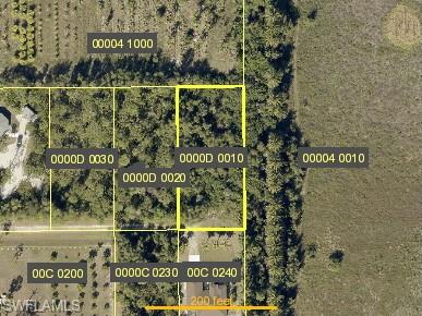 Discover the possibilities on beautiful Pine Island with this oversized approximately ½-acre homesite tucked away at the end of a quiet road. This lot has electricity available and is on Pine Island Water! Offering added privacy and plenty of space to design your ideal island retreat, this property provides a rare opportunity to enjoy the laid-back lifestyle that makes Bokeelia so desirable. Pine Island Water and electric service are available, making the path to building even more convenient. Surrounded by the natural beauty, fishing, boating, and small-town charm of Pine Island, yet just a short drive to local restaurants, marinas, and everyday conveniences, this is the perfect location for your future home or investment property. Don't miss your chance to own a spacious piece of Southwest Florida paradise.