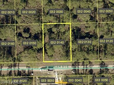 This vacant lot is ready for your new home and is centrally located in the heart of Lehigh acres!