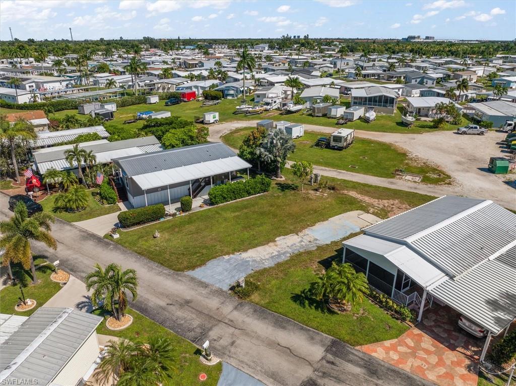 Discover this Unique vacant lot in the highly desirable Thunderbird community—where you own your land. Conveniently located by the outdoor storage lot.  Great price for its location! Thunderbird is one of Fort Myers’ best kept secrets, a friendly 55+ manufactured home community perfectly positioned just minutes from Fort Myers Beach and Sanibel Island. Enjoy quick access to restaurants, shopping, grocery stores, and medical services. All utilities are available, making this an ideal spot for your next home. Community Highlights • Resident-owned community — self managed with no corporate ownership • Low HOA fees — just $100/month • Heated pool & shuffleboard — perfect for year-round enjoyment • Spacious clubhouse — hosts regular dinners, activities, and social events • Outdoor storage lot — ideal for extra vehicles, boats, or recreational toys.  Location Thunderbird located off San Carlos Boulevard. Enter directly from San Carlos for easy access.