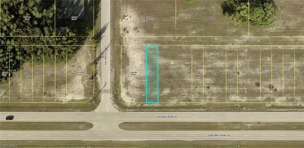 Vacant Commercial lot in a high traffic location. Mostly cleared with just grass. Zoned C-1.