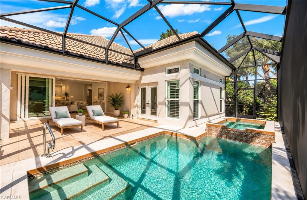 One or more photo(s) has been virtually staged, AI generated or rendered.  One or more photos have been virtually staged, AI-generated, or rendered. Beautifully reimagined with sophisticated finishes & an impressive collection of recent improvements, this 3-BEDROOM, 2.5 BATH single-family home is located in Montara at Bonita Bay, one of Bonita Springs’ most sought-after gated communities. Blending timeless elegance, modern convenience & relaxed Florida living, this lovely home features an open floor plan, abundant natural light & a private outdoor retreat with a pool & spa. The gracious interior features luxury vinyl flooring throughout (2022), plantation shutters & beautifully proportioned living spaces ideal for everyday comfort or entertaining. The remodeled kitchen (2022) combines style & functionality with generous cabinetry, stainless steel appliances & an induction cooktop. The open-concept design seamlessly connects the kitchen, dining & living areas. The spacious primary suite offers a peaceful sanctuary with direct lanai access, a custom walk-in closet & an elegant en-suite bath featuring dual vanities & a walk-in shower. Equally appealing are the home's extensive improvements, reflecting a considerable investment in quality, comfort & peace of mind. Significant updates include a tile roof (2022), pool cage (2022), air-conditioning system & ductwork (2020) & whole-home Briggs & Stratton generator (2020). Additional enhancements include a Culligan water treatment system (2026), water heater (2025), gutters (2022), impact-resistant front door & electric hurricane shutters protecting the lanai. The garage features epoxy flooring, cabinetry & storage (2022), a ceiling-mounted storage rack & an additional refrigerator. The laundry room offers a distinctive touch with its charming barn-style sliding door. Outdoors, the inviting pool & spa provide a delightful setting for leisurely afternoons, intimate gatherings, or simply enjoying the beauty of Southwest Florida. The desirable corner-lot location enhances the home's appeal, while the integrated indoor & outdoor living spaces capture the celebrated Bonita Bay lifestyle. Montara at Bonita Bay offers an extraordinary opportunity to enjoy refined living surrounded by the natural beauty of one of Southwest Florida's most distinguished communities. Encompassing approximately 1,400 acres along Estero Bay, Bonita Bay is renowned for its tropical landscapes, preserved natural surroundings, miles of scenic walking & biking paths, waterfront parks, private beach facilities & on-site marina. Optional membership in the prestigious Bonita Bay Club provides access to five championship golf courses, outstanding tennis & pickleball facilities, a state-of-the-art fitness center & spa, exceptional dining & an active social calendar. Ideally located in Bonita Springs, this lovely Montara residence offers convenient access to shopping, dining, Gulf beaches & RSW Airport. Understated luxury in a fine community!