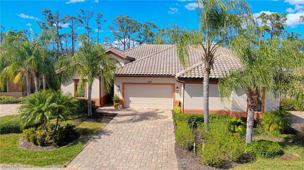 Discover the charm of this attached villa nestled within the renowned Paseo Gated Community, an award-winning haven. Boasting 2 bedrooms, a spacious den, and 2 full bathrooms. This residence features an attached 2-car garage and an expansive screened lanai. Immerse yourself in the luxury of upgrades such as tile floors throughout, granite kitchen countertops, plantation shutters, stainless steel appliances, a whole-house water filtration system with reverse osmosis in the kitchen, and accordion storm/hurricane shutters on windows. Your security is enhanced with a comprehensive home security system. Experience the Village Center's array of amenities, including a resort-style swimming pool with a tiki bar, bocce, tennis and pickleball courts, a library, on-site casual and fine dining, a fitness center, a movie theater, an ice cream shop, a spa, and salon, among other offerings. Conveniently located near shopping, the airport, local restaurants, and golf courses, this prime spot is also in proximity to baseball spring training facilities. Don't miss the chance to explore and appreciate the allure of this remarkable property.