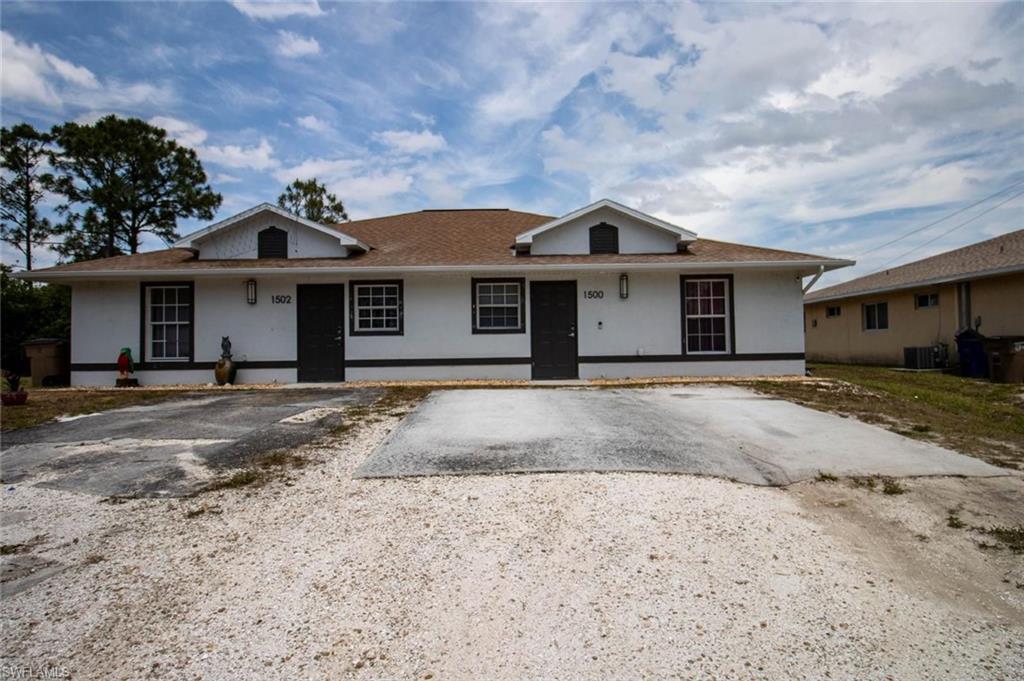 INVESTMENT OPPORTUNITY | DUPLEX Offered at $329,900, this duplex in Lehigh Acres presents an excellent opportunity for investors or owner-occupants seeking an income-producing property with future potential. The property features 4 bedrooms, 4 bathrooms, and approximately 1,928 square feet of gross living area, with two separate units. The property has undergone some remodeling, although the renovations are not fully completed and additional cosmetic updates may be desired. This provides an opportunity for a new owner to complete improvements and add value over time. Both units are currently leased on a month-to-month basis, offering immediate rental income while providing flexibility for future rental strategies, renovations, or owner occupancy. One of the property's standout features is its canal-front rear exposure, offering a desirable setting, additional privacy, and an attractive outdoor environment. The property also has no HOA, helping simplify ownership and potentially reducing ongoing expenses. Whether you're looking to expand your rental portfolio, generate rental income, or take advantage of the flexibility provided by two separate units, this canal-front duplex is an opportunity worth exploring.
