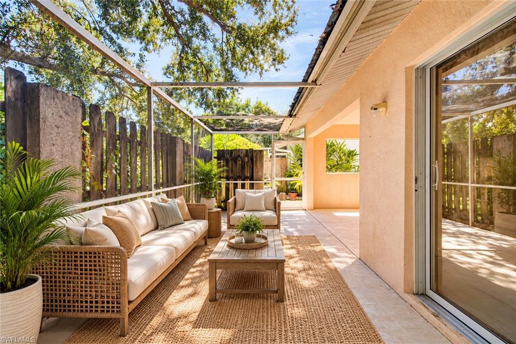 INVESTMENT OPPORTUNITY IN THE HEART OF BONITA SPRINGS! Bring your vision to this 2-BEDROOM, 2-BATH ATTACHED VILLA in Morton Grove, offering 1,134 square feet of living space, an ATTACHED 1-CAR GARAGE, and the opportunity to create a home that reflects your style. Step inside to a welcoming kitchen featuring white cabinetry and space to bring your design ideas to life. The living room provides a comfortable setting for everyday living and gathering with guests, while two generously sized bedrooms offer restful retreats. Two well-appointed bathrooms complete the interior, with opportunities to refresh the finishes to your taste. An enclosed, screened lanai creates an inviting spot for morning coffee, reading, or relaxing after a day exploring Southwest Florida. 
PLUMBING UPDATES IN 2026 include a new water heater, toilets, faucets, and valves. The A/C was serviced in 2026, the lanai enclosure has been repaired, and the front door has been freshly painted. The old carpet has been removed and the home cleaned, providing a head start for your planned improvements. Offered AS-IS, this villa is ready for your ideas for new flooring and kitchen and bathroom updates. Morton Grove offers a COMMUNITY POOL, CLUBHOUSE, and lawn maintenance, with a convenient location near shopping, dining, Gulf beaches, US-41, and I-75. Whether you envision a seasonal retreat, a year-round residence, or an investment property, this villa offers an appealing opportunity to make it your own!