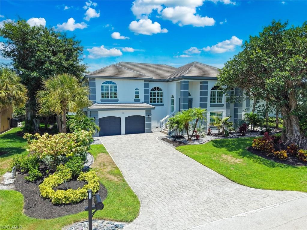 Nestled within the prestigious Beachview Estates at Sanibel Island Golf Club, this exceptional custom residence offers the ultimate islandlifestyle just steps from the beach, clubhouse, and The Ibis Grill. Surrounded by lush tropical landscaping, the home showcases a privateresort-style setting with a tranquil heated pool and spa designed for year-round enjoyment. Thoughtfully designed for both comfortableliving and elegant entertaining, the spacious floor plan features soaring ceilings, abundant natural light, and quality craftsmanshipthroughout. The chef's kitchen is appointed with premium appliances, a generous walk-in pantry, and opens seamlessly to an invitingfamily room. A private office is conveniently situated adjacent to the living room, while the formal dining area complements the home'ssophisticated gathering spaces. Expansive sliding glass doors from both the living and family rooms open to the enclosed lanai, creatinga seamless indoor-outdoor living experience centered around the pool and spa. The residence offers three bedrooms and three-and-one-half baths, including a luxurious primary suite with a private sitting area and spa-inspired bath. The lower level features a two-car garageand extensive storage space, providing ample room for vehicles, recreational equipment, and more. With abundant outdoor living areasand an unparalleled location near Sanibel's pristine beaches and premier amenities, this remarkable home embodies the essence ofcoastal luxury living. Live every day as though you're on vacation. Sanibel Island is world famed as a beautiful seaside resort endowedwith miles of pristine beaches, excellent shelling, and scenic bike paths. Fishing, boating, golf, wildlife habitat and cultural attractionscomplement the gracious lifestyle.