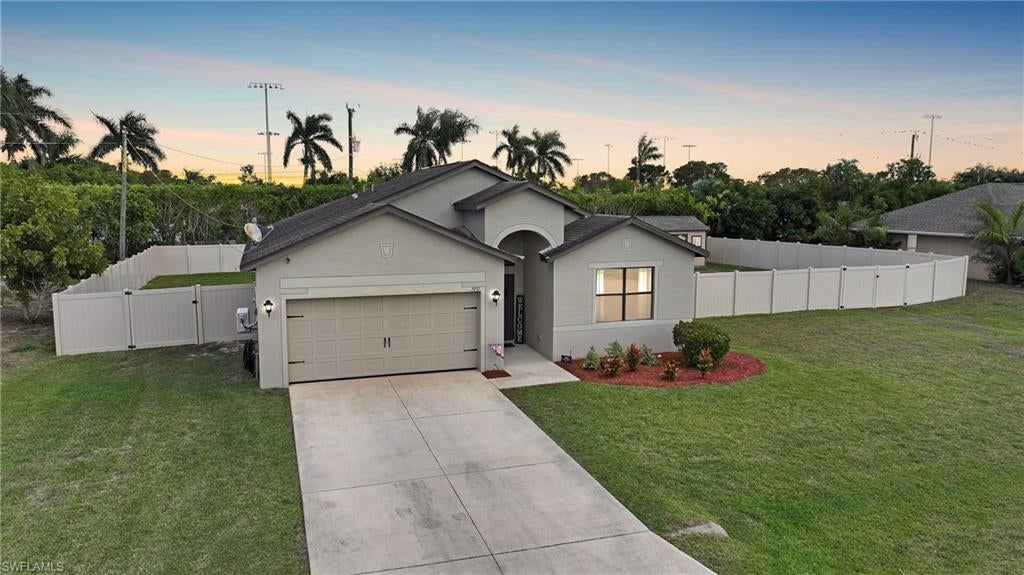 Discover the perfect blend of modern comfort and convenient living at 2937 SW 4th Ave in Cape Coral—a newer construction home boasting approximately 1,616 sq ft of thoughtfully designed space on a generous 0.34-acre, three-lot homesite. This 3-bedroom, 2-bathroom residence features a luminous open-concept layout with contemporary finishes, clean lines, and soothing neutral palettes that create an inviting atmosphere for daily life or hosting guests.

The split bedroom layout provides privacy for the primary suite, which features a spacious bedroom, walk-in closet, and private bathroom. Additional bedrooms are generously sized and versatile, making them ideal for guests, family members, or a home office. The home’s design maximizes usable space while maintaining a simple, efficient flow.

The two-car garage is equipped with a mini-split system, offering climate-controlled space perfect for a workshop, home gym, hobby area, or additional storage without sacrificing comfort. Outside, the fully fenced backyard provides a rare amount of open green space, ideal for pets, play, or future outdoor additions, and is supported by an in-ground irrigation system to keep the expansive lawn looking its best year-round. The oversized yard also offers ample space and access for parking a boat or RV, a highly sought-after feature in Cape Coral. A covered rear patio extends the living area outdoors and creates a shaded spot for morning coffee or evening gatherings.

A detached storage shed with power adds exceptional flexibility for tools, equipment, or hobby use, setting this property apart from comparable homes. The exterior presents clean curb appeal with a well-kept lawn, neutral tones, and an inviting front entry. Located in an established neighborhood with no HOA restrictions, this home offers flexibility, privacy, and freedom rarely found at this price point.

One of the standout features of this location is its proximity to Saratoga Lake Park and being just one block from Koza-Saldino Park, offering nearby green space, walking areas, and recreational amenities. Beyond the parks, the home is centrally positioned within Cape Coral, providing quick access to shopping, dining, schools, medical facilities, and everything that defines the Cape Coral lifestyle, from waterfront recreation to everyday conveniences.