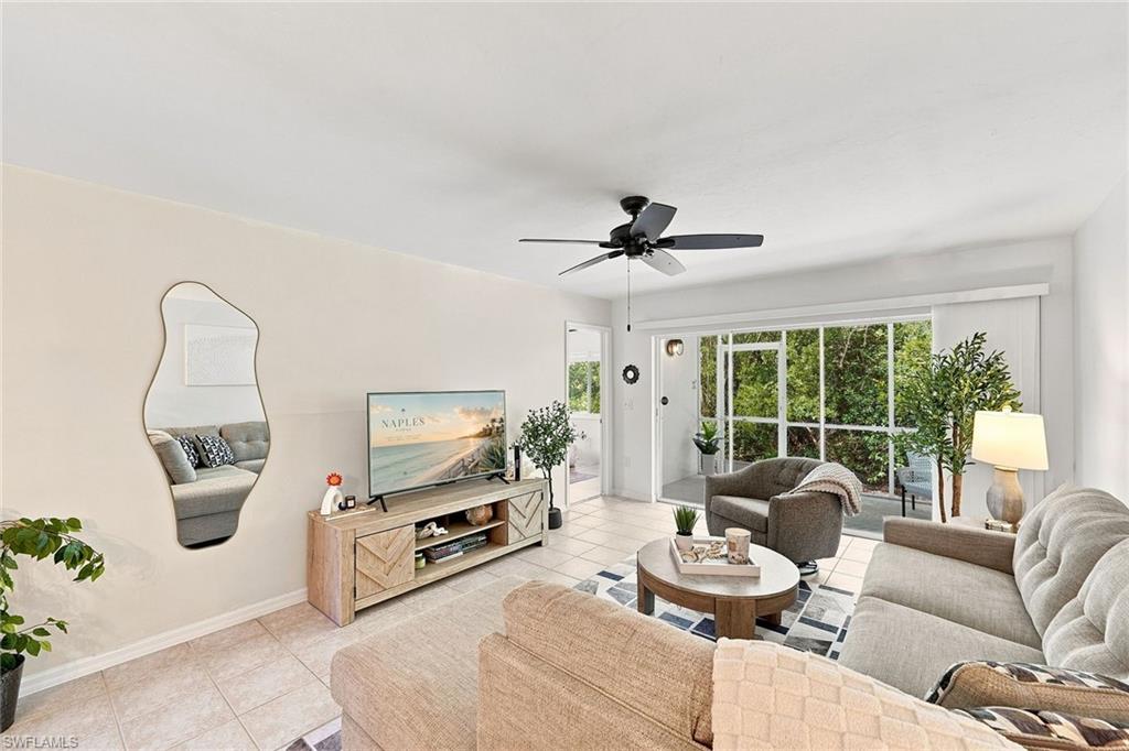 Newly refreshed 2-bedroom, 2-bath end unit featuring all-new furnishings and a comfortable, functional layout in desirable Naples Sandpiper Bay. Fully equipped bright kitchen with breakfast bar, large great room with comfortable layout, and a full-size dining area, framed by sliders looking out to your peaceful private screened lanai. Spacious primary suite includes a private en-suite bathroom and large walk-in closet, while the second bedroom offers additional space for guests, a second full bath and in unit laundry. Residents enjoy access to 2 community pools, clubhouse with grilling area and an active social scene. Conveniently located just minutes to Olde Naples with easy access to area beaches, waterfront dining, shopping, golf courses, parks, and entertainment.