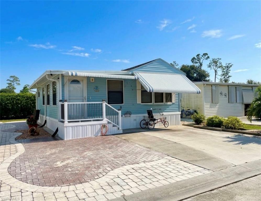 Resort-style living at an affordable price! This 1Br/1.5Ba home (that includes an ample-size bonus room with ceramic tile flooring) could be just what you need before winter occurs. Thank you for viewing 426 Vanda Sanctuary in the Imperial Wilderness Condominium Association of Naples, FL. This particular community was never flooded and is well-known for outstanding maintenance, friendly residents, and a strong sense of community. Of particular interest, this community features LAND that YOU OWN! When you purchase your home, you own the land and the house— it is not a co-op or land lease. Recent updates include the following: an updated kitchen with induction burners, convection oven, large sink, and stainless-steel refrigerator; laminate plank flooring; ceiling fans; half bathroom; and sleeper sofa. The home is being sold furnished, and the trike bike is negotiable. Outside, patio pavers add additional seating space for relaxing in the Florida sunshine, while the windows feature clamshell shutters for shade and storm protection. This home is an economical option for full-time residency, seasonal, or as an income-generating property. IWCA is brilliantly located. It is approximately 3 miles to shopping and restaurants, 11 miles to the Naples beaches, and 8 miles to the Marco Island beaches. Airport access is also easily attainable— a 45-minute drive (RSW). Maximizing the opportunity to affordably own property in Naples, FL, the HOA fee of $898. per quarter is exceptionally reasonable. That fee covers many of your needs: the advantage of a gated community, water, sewer, lawn care, basic cable, trash, recycling, and community amenities. Community amenities include 2 pools with spas, bocce, pickleball, pétanque, tennis, shuffleboard, billiards, ping pong, a library, clubhouse, 2 dog parks (1 pet, 40lb. max.), and a nature trail. Electric golf carts are allowed in this community, and there is an extremely active events calendar.