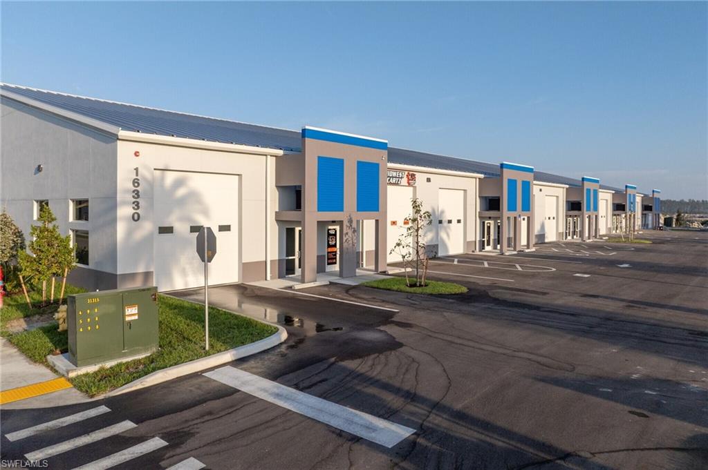 ITEC Flex Space – 2,033 SF Industrial/Flex Unit fully Leased Investment Opportunity. This 2,033-square-foot flex space is fully leased through 01/31/2029, CAP rate of 6.7% with a tenant option to renew, offering a turnkey income-producing investment in one of Southwest Florida's fastest-growing industrial corridors. Located just 1.7 miles east of I-75 on Alico Road, this premium flex space development sits minutes from Southwest Florida International Airport (RSW) and is surrounded by a thriving mix of logistics, tech, and trade businesses. Property Features: Fully air-conditioned personal/business flex space 20' high ceilings, 29' wide bay 14' high x 12' wide electric roll-up door, 3-phase electrical panel Fire alarm & suppression system, Overhead energy-efficient LED lighting, Epoxy floors, Glass front entrance with modern exterior architecture, ADA-compliant bathroom and wide entry access and a designated office/reception space.