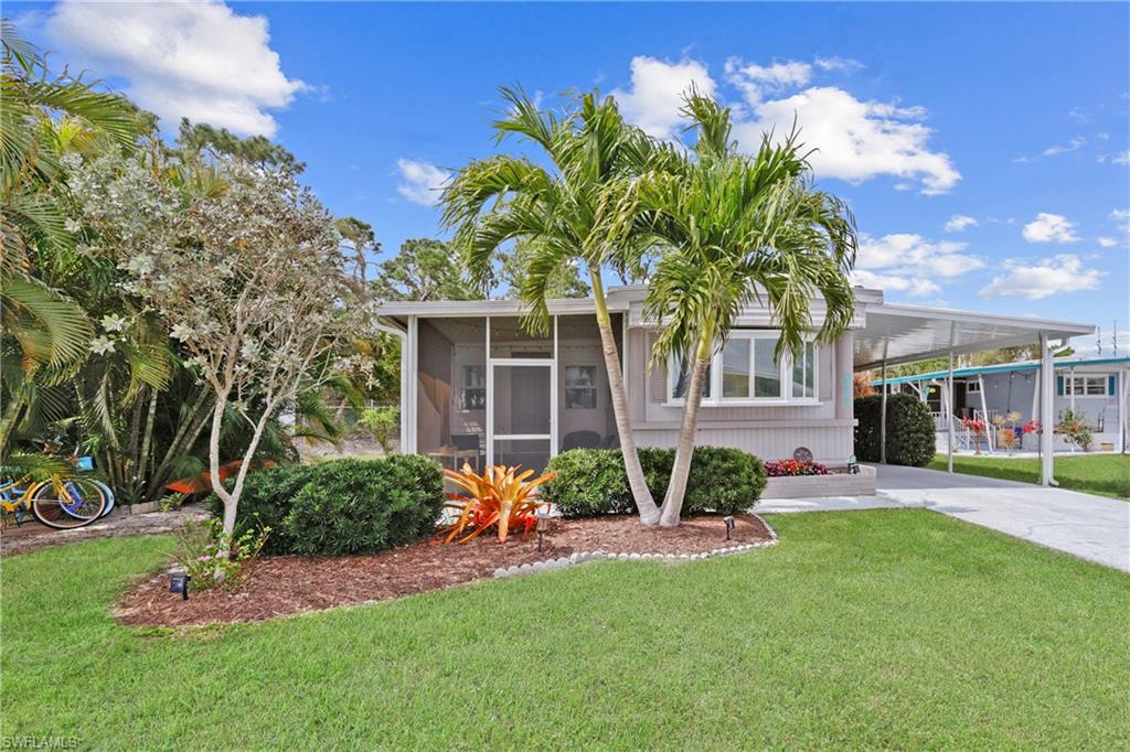 REDUCED AND PRICED TO SELL!!! GREAT OPPORTUNITY TO OWN THIS BEAUTIFUL, FURNISHED, 2-BED, 1-BATH HOME IN 55+ FOREST PARK WHERE YOU OWN THE LAND, ENJOY LOW HOA FEES, FREE WIFI, AND OTHER GREAT AMENITIES. Of special note is that the home is situated in a nice setting with wooded backyard privacy.  Home is landscaped with plants, orchids, palm trees, and has a patio with fire pit. The screened front porch is a perfect spot to enjoy your morning coffee as well as the Florida evenings (your pet will love this spot, too!). The extra long driveway gives you even more outdoor space with a perfect barbecue area right off the kitchen. Step inside and see the pretty white kitchen, attractive laminate flooring, beautiful bathroom, and upgraded windows.  Attractive, modern overhead fans are brand new. Home had a roof over in 2022 and has a new electrical panel. Along with the free wifi, Forest Park offers a swimming pool, shuffleboard, beautiful clubhouse, nicely landscaped grounds, two walking/running tracks, fun activities, holiday parties, nice neighbors, and the park is just minutes from restaurants, shopping, and downtown Fort Myers. The HOA is $122/month. You'll love this sweet home--come and see it today!