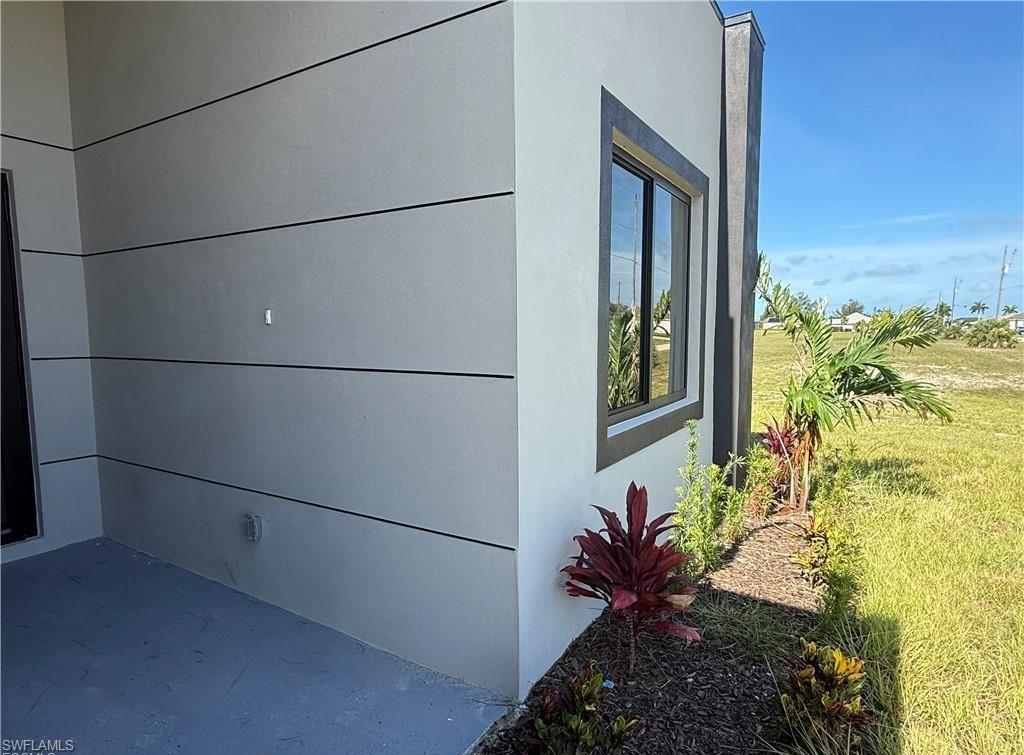 Beautiful Lot home, make it yours now! Bright and spacious property in a prime location, offering a peaceful residential setting with quick access to green areas and outdoor recreation. Discover this stunning, move-in-ready new construction home offering 1737 sq ft of living area located in the fastest-growing area of Cape Coral. Featuring a sleek contemporary layout with 10-foot ceilings and elegant tile flooring throughout, this residence boasts 4 spacious bedrooms and 3 stylish bathrooms. Enjoy a gourmet kitchen with white cabinetry, quartz countertops in both the kitchen and bathrooms, and stainless steel appliances. Bathrooms feature frameless glass-enclosed showers/bathtubs, adding a luxurious touch. A washer and dryer are also included for your convenience. The open floor plan seamlessly connects living, dining, and kitchen areas, while the private backyard offers a peaceful retreat. Built with Stem Wall foundation for enhanced elevation and structural strength, this home also features impact-resistant windows and doors, automatic garage door, irrigation system, and high-end finishes throughout. This property is ideal for families, snowbirds, or investors. Plus, it includes a builder’s warranty 2-years and 10-year structural coverage offering peace of mind for years to come. Don’t miss this incredible opportunity to own a high-quality home in a booming location!-WITH SHELVES, FILTER AND BLINDS