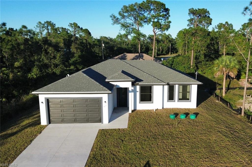 Why rent when you can build equity in your own home? Located in a quiet, friendly neighborhood with easy access to local shopping, dining, and major roads across Lee County. Own your dream home at Lehigh acres, This brand-new 3-bedroom, 2-bathroom home offers a spacious open floor plan, modern kitchen, and plenty of room to grow—all on a large lot .23 Move-in ready and waiting for you,  seller is motivated !!start making memories in a home you can call your own. Schedule your showing today and make this Christmas extra special!